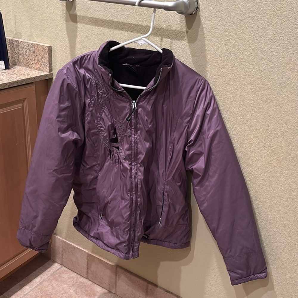 Kerrits woman's purple puffer jacket